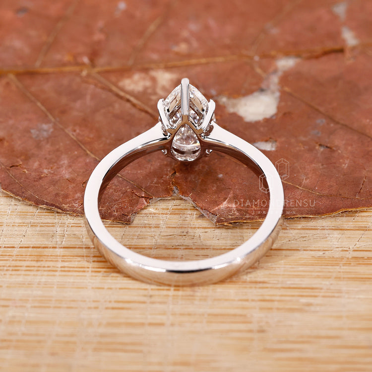 Buy Engagement ring with tapered pave band style.
