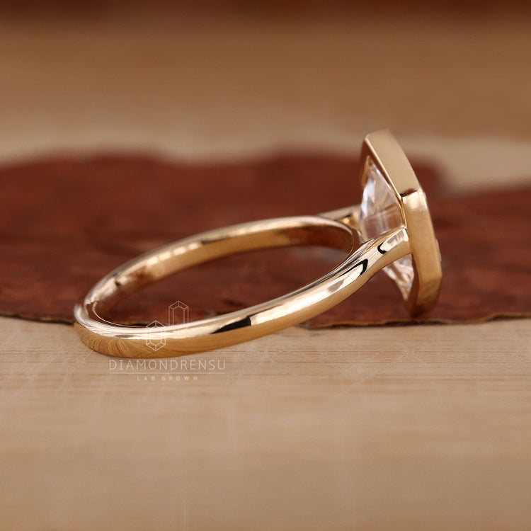 Yellow gold engagement ring used in solitaire engagement ring.

