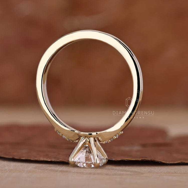 Lab Grown Diamond in round engagement ring style.
