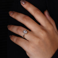 Simple ring made with emerald cut engagement ring.
