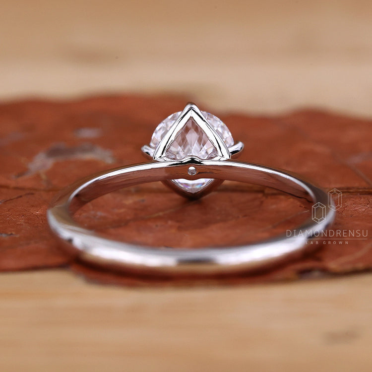 IGI certified diamond ring with compass prong setting.
