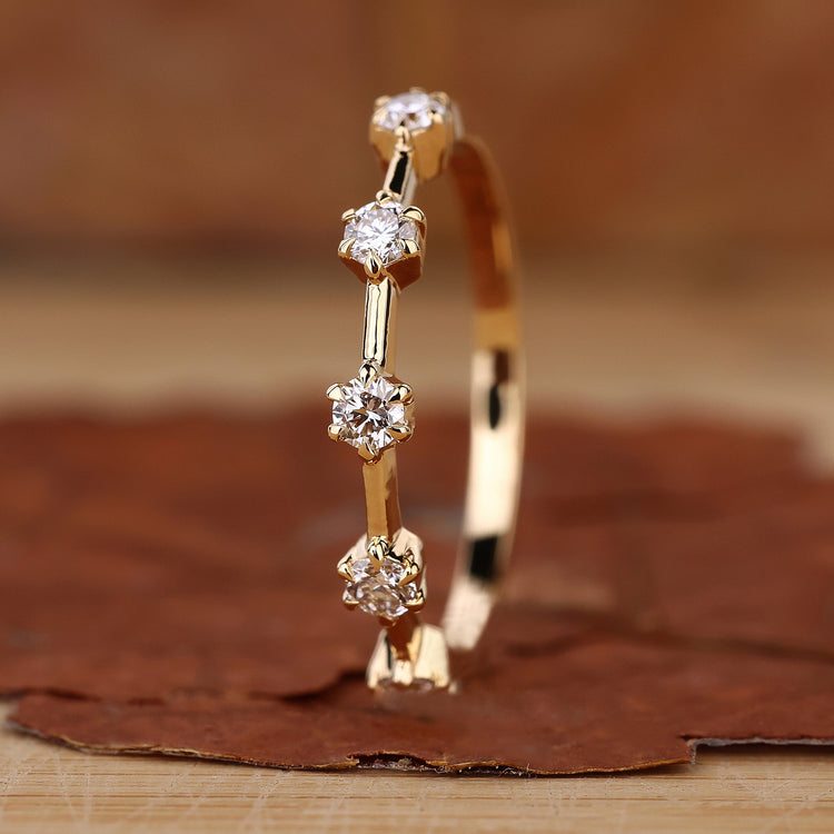 Claw prong setting fits 5 stone diamond band.
