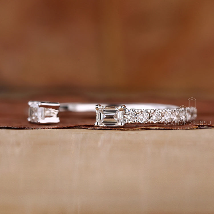 Lab grown diamond in white gold wedding band.
