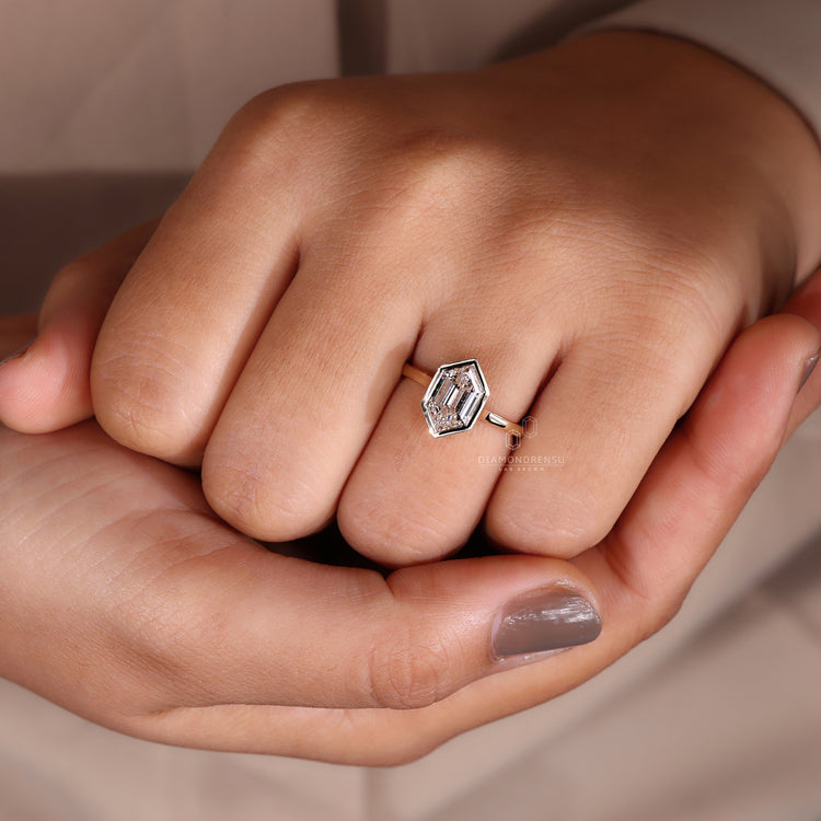 Bezel set diamond ring in hexagon engagement ring.
