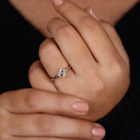 Yellow gold solitaire ring with asscher cut diamond.
