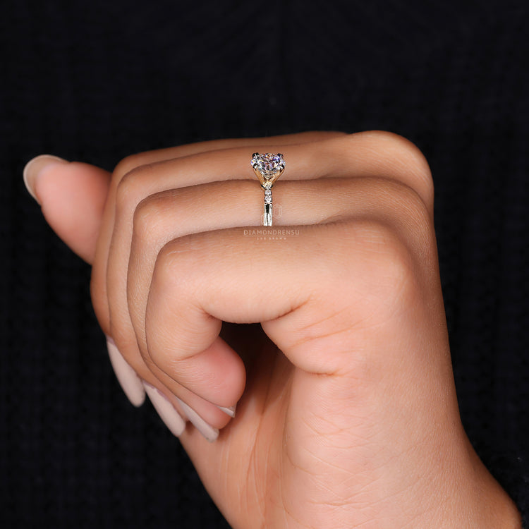 IGI certified tab prongs round engagement ring.
