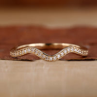 Wave eternity band in yellow gold wedding band.
