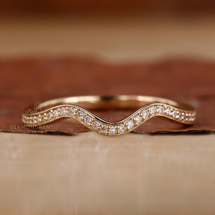 Wave eternity band in yellow gold wedding band.
