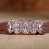 oval engagement ring in rose gold band.
