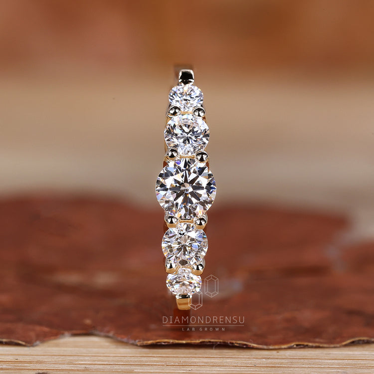 Buy wedding band in 5 stone design.
