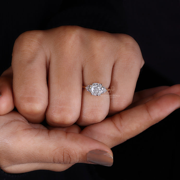 3 stone diamond ring paired with tapreded shank ring.
