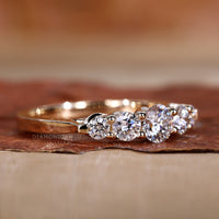 Lab grown diamond in yellow gold band.
