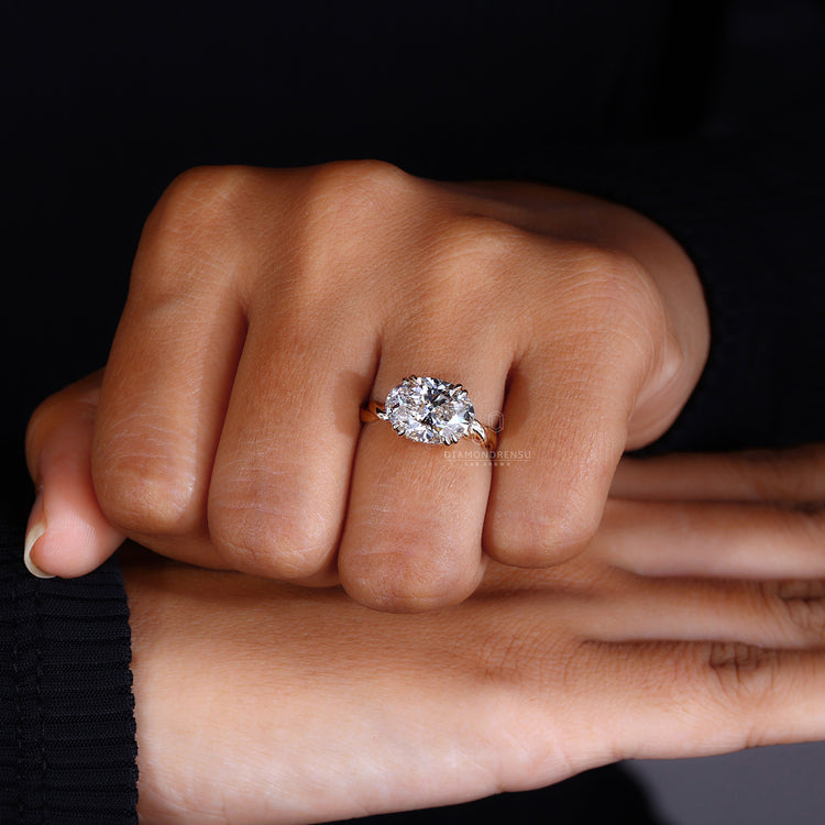 Handmade ring featuring oval diamond design.
