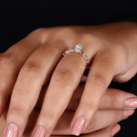 Yellow gold engagement ring with a clean polished finish.
