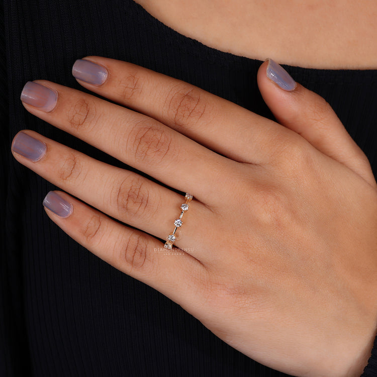 Distance pave band on yellow gold wedding band.
