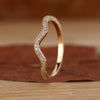 Stackable eternity band with wave eternity band.
