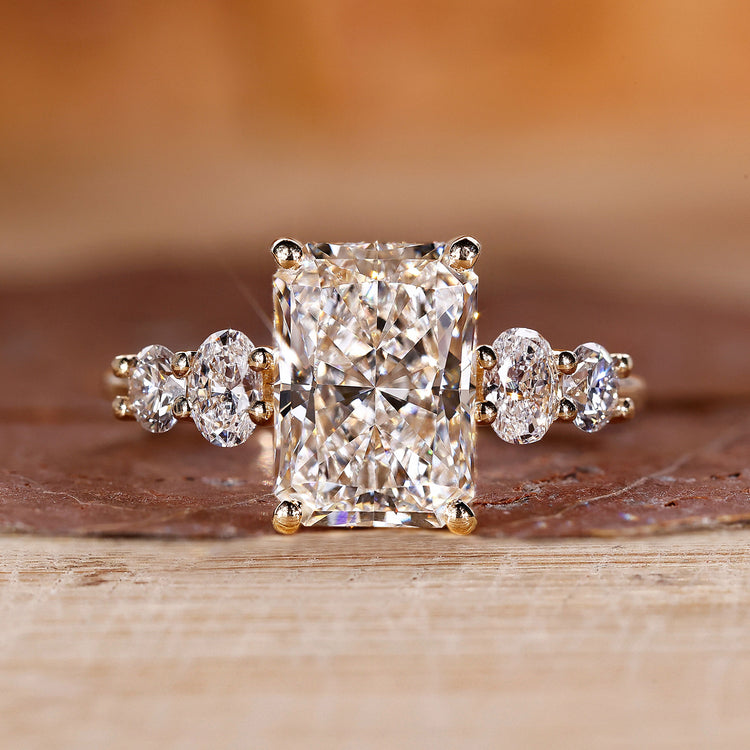 Radiant diamond engagement ring with 5 stone engagement ring.
