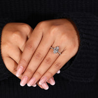 Yellow gold engagement ring with 6 claw prong setting.
