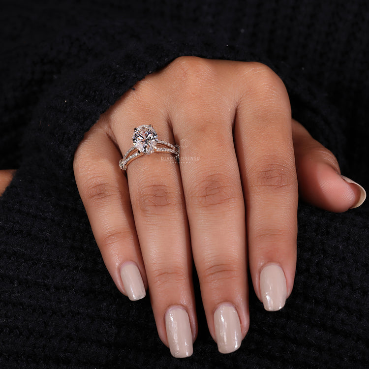yellow gold engagement ring with hidden halo design.
