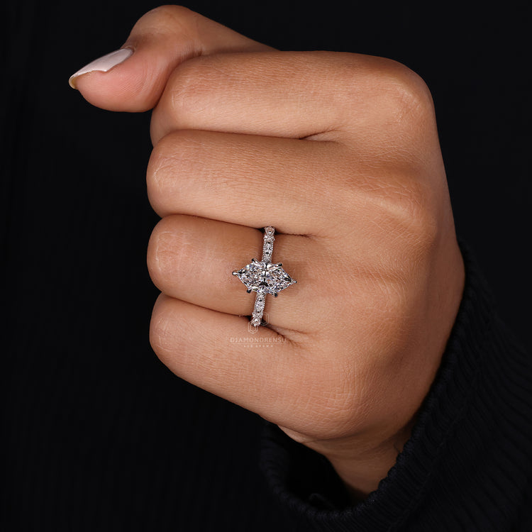 customise ring with round cut side stones.
