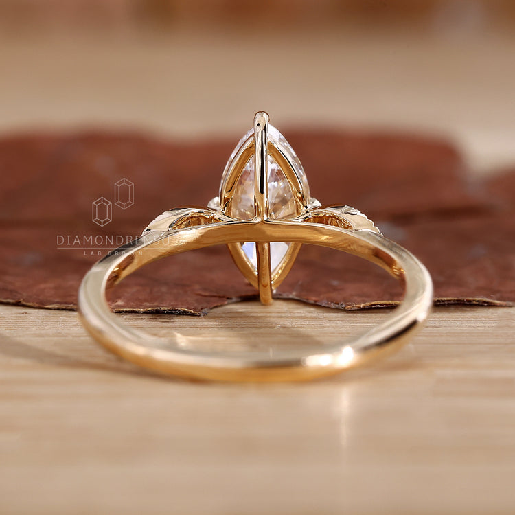 Buy engagement ring with compass prong marquise setting.
