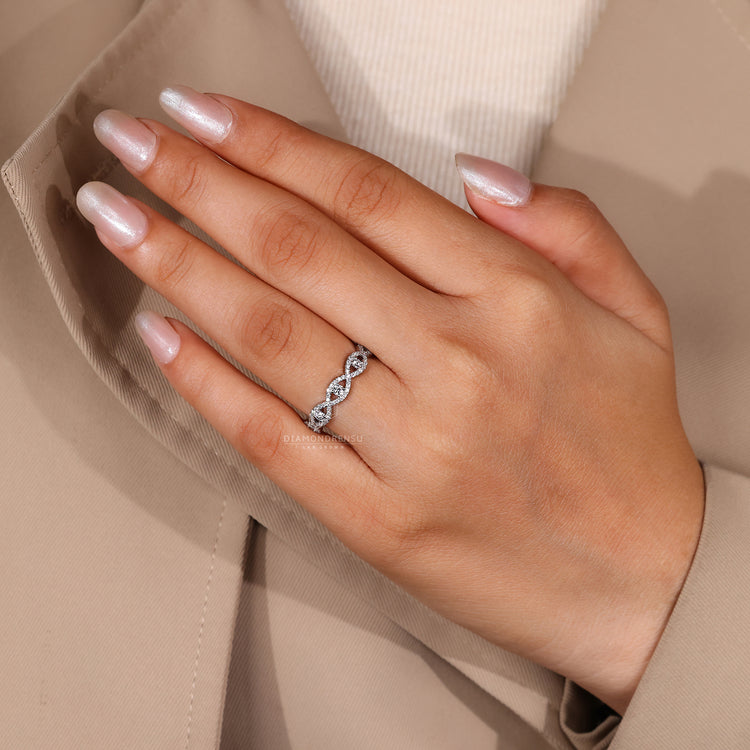 Handmade Band with round diamonds and custom twisted look.
