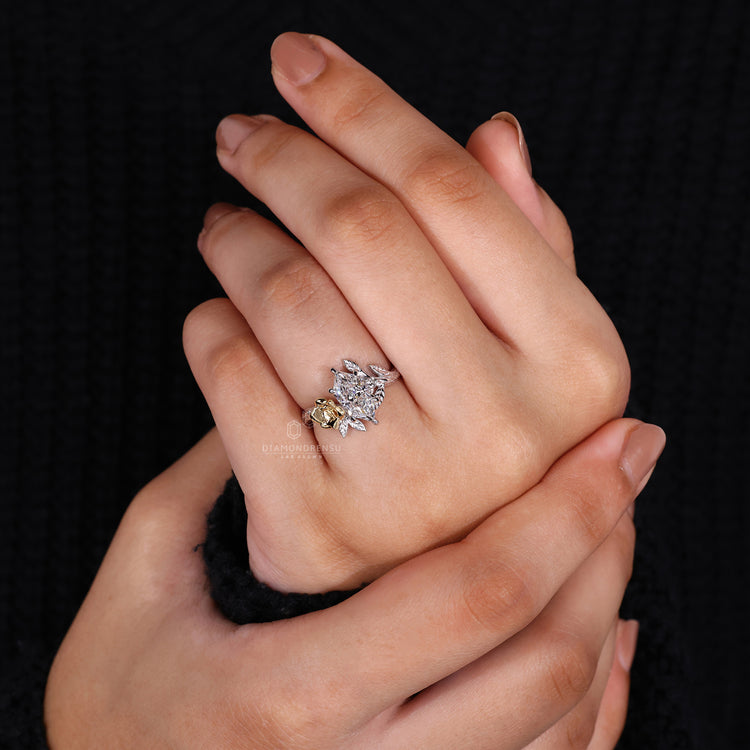 Customise ring with round side stones and Dutch marquise centre diamond.
