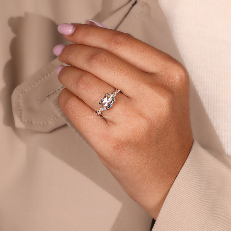 Lab grown diamond ring with double claw prongs and hidden halo.
