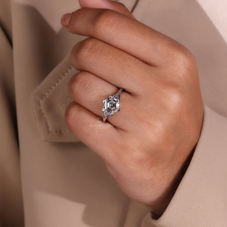 IGI certified ring with triangle side stone.
