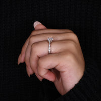 cathedral setting ring with 4 prong setting detail.
