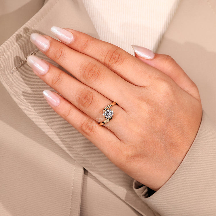 IGI Certified Engagement Ring in bypass style setting.
