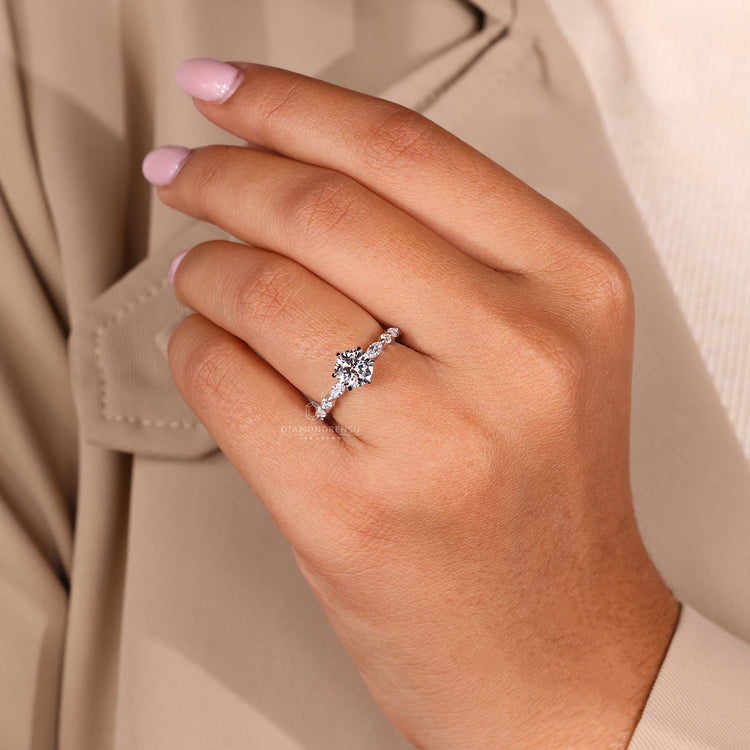 IGI certified diamond ring crafted with marquise and round stones.
