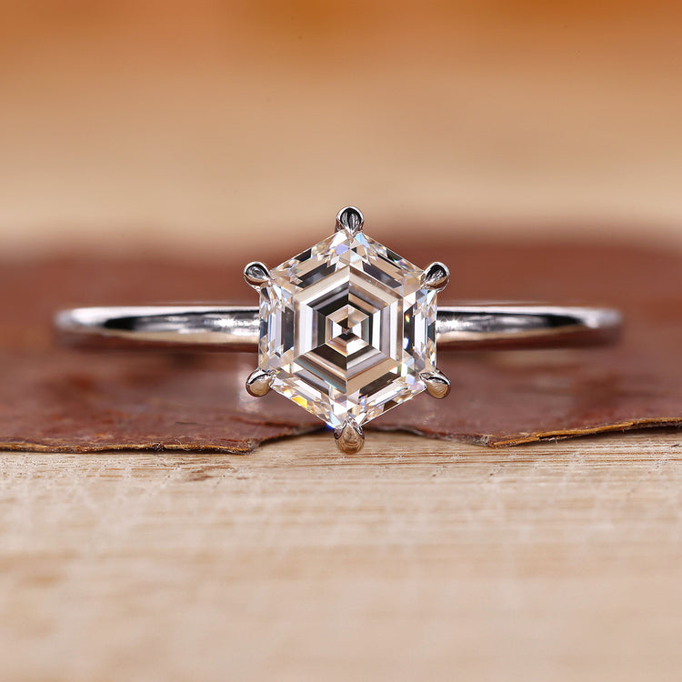 Hexagon step cut diamond ring in white gold diamond ring.
