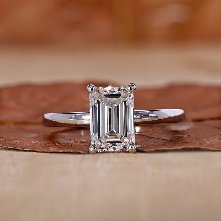 Emerald Cut Diamond Ring with hidden halo engagement ring.
