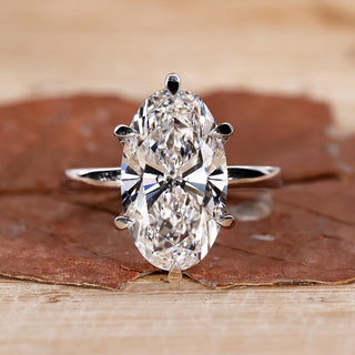 Solitaire Diamond Ring with moval diamond engagement ring.
