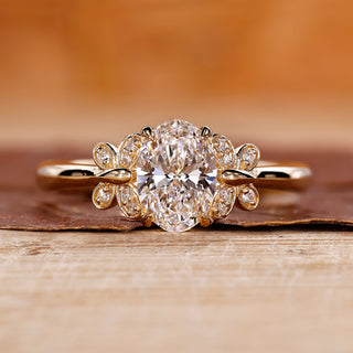 Oval shaped diamond ring with butterfly setting engagement ring.
