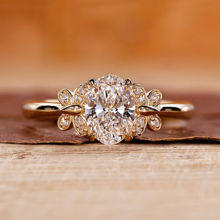 Oval shaped diamond ring with butterfly setting engagement ring.
