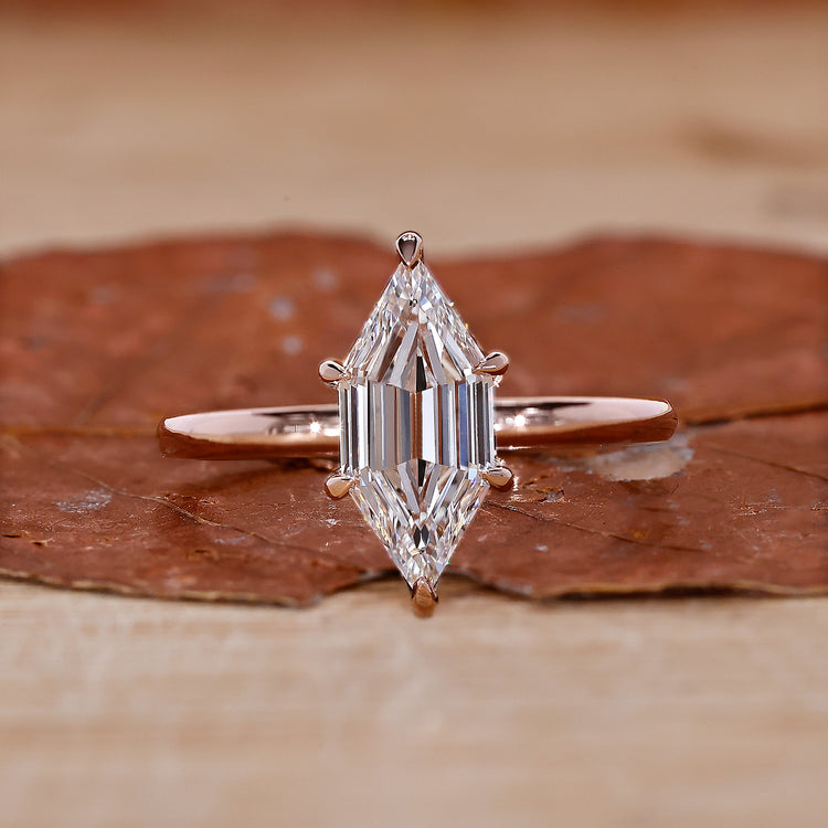 rose gold ring with hexagon step cut diamond ring.
