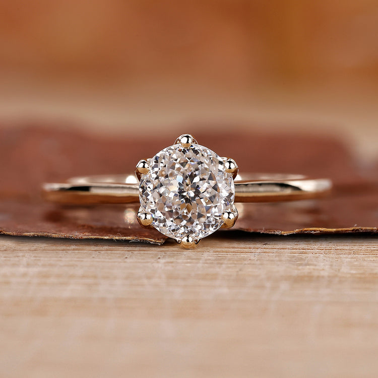 Cathedral Setting Ring with Portuguese cut diamond ring.
