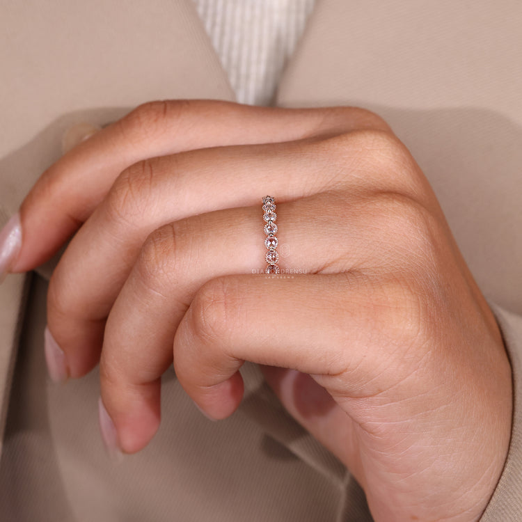Milgrain Wedding Band in shared prong setting and custom design.
