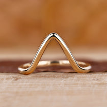 Gold chevron wedding band for her.
