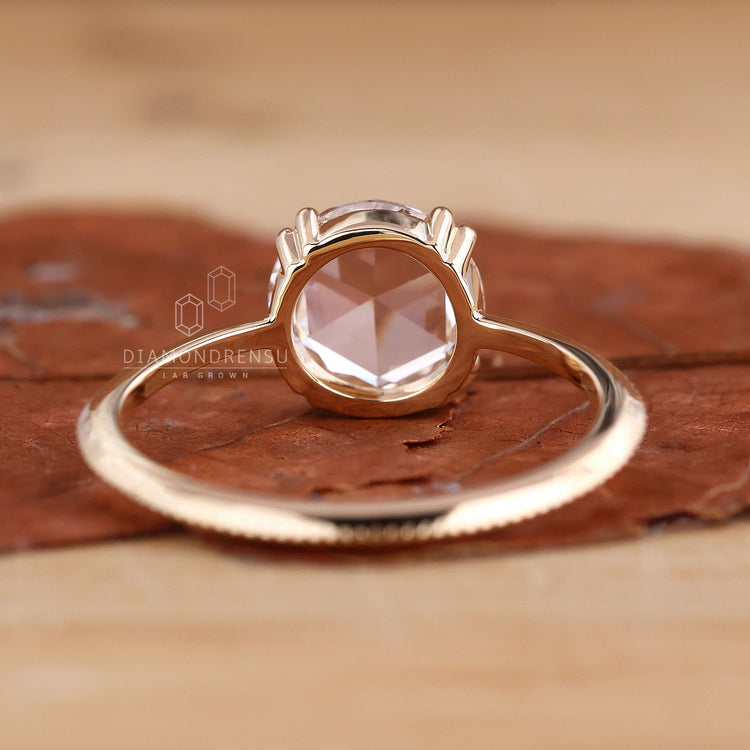 Buy Engagement ring with a yellow gold engagement ring.
