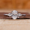 Three stone diamond ring in white gold ring.
