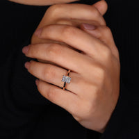 Cathedral setting engagement ring offering elegant height.
