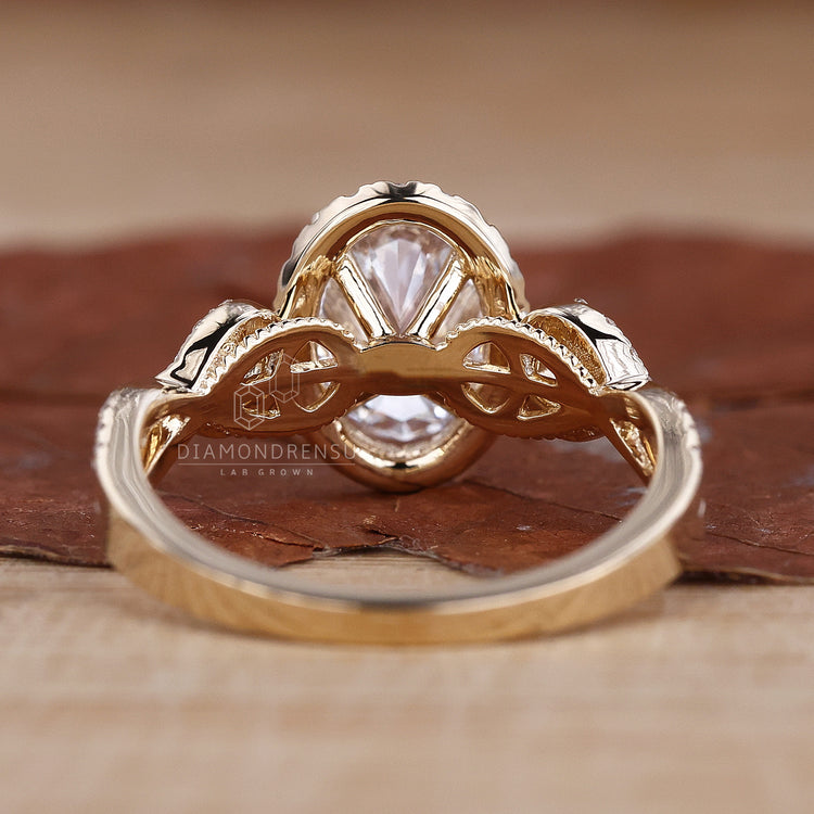 Engagement ring Australia with oval cut diamond and pave band.
