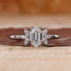 White Gold Engagement Ring with marquise side stones.
