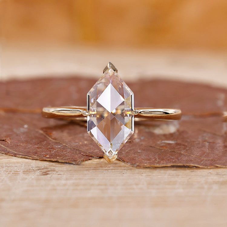 Yellow gold diamond ring with Dutch marquise cut and tapered shank.
