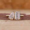 Toi et moi engagement ring with emerald and pear cut ring.
