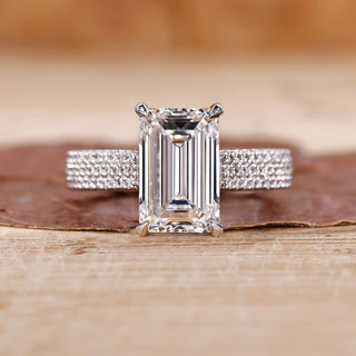 Emerald cut diamond engagement ring in white gold ring.

