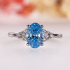 Oval diamond engagement ring set in muse setting.

